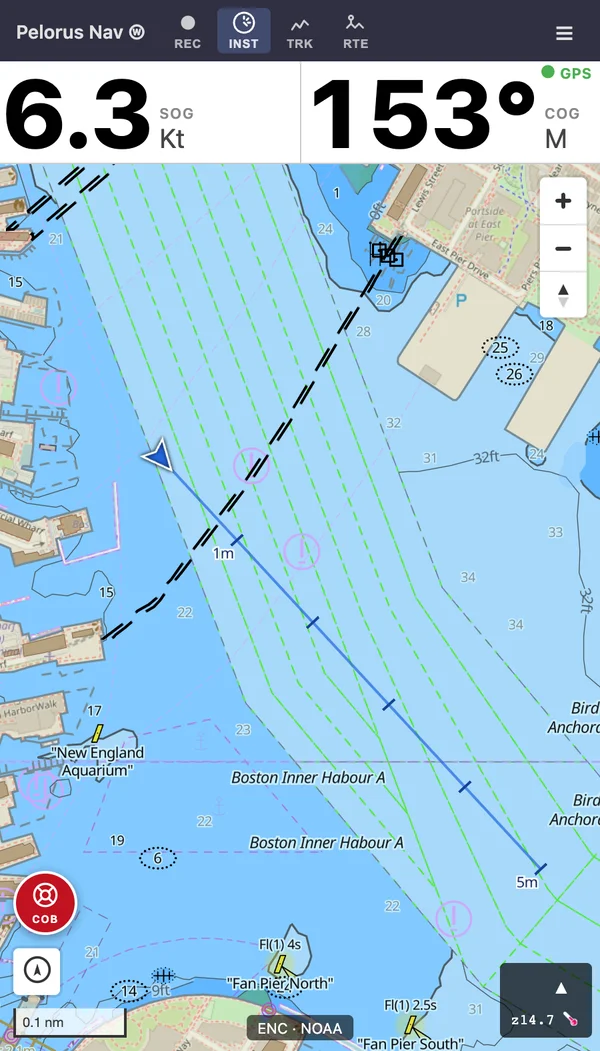 Pelorus Nav on a phone: vessel heading down Boston's inner harbor past the New England Aquarium, with lighted buoys, shipping lanes, a projected course line, and large speed and course readouts